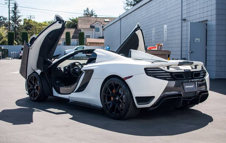 white McLaren 650S Spider with the doors open